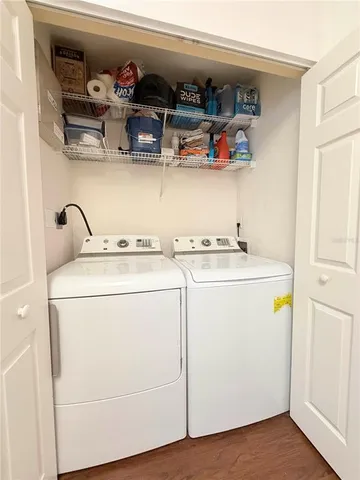 a utility room with dryer and washer