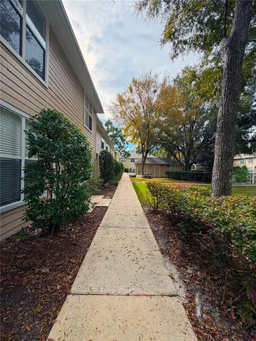 a view of swimming pool with a backyard