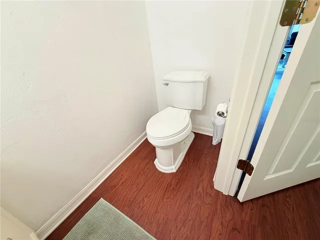 a bathroom with a toilet and a sink