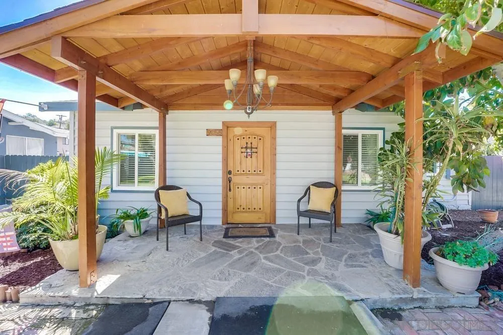 9055 Rosedale Drive Spring Valley, CA 91977 - Photo 2 of 38 a backyard of a house with outdoor seating