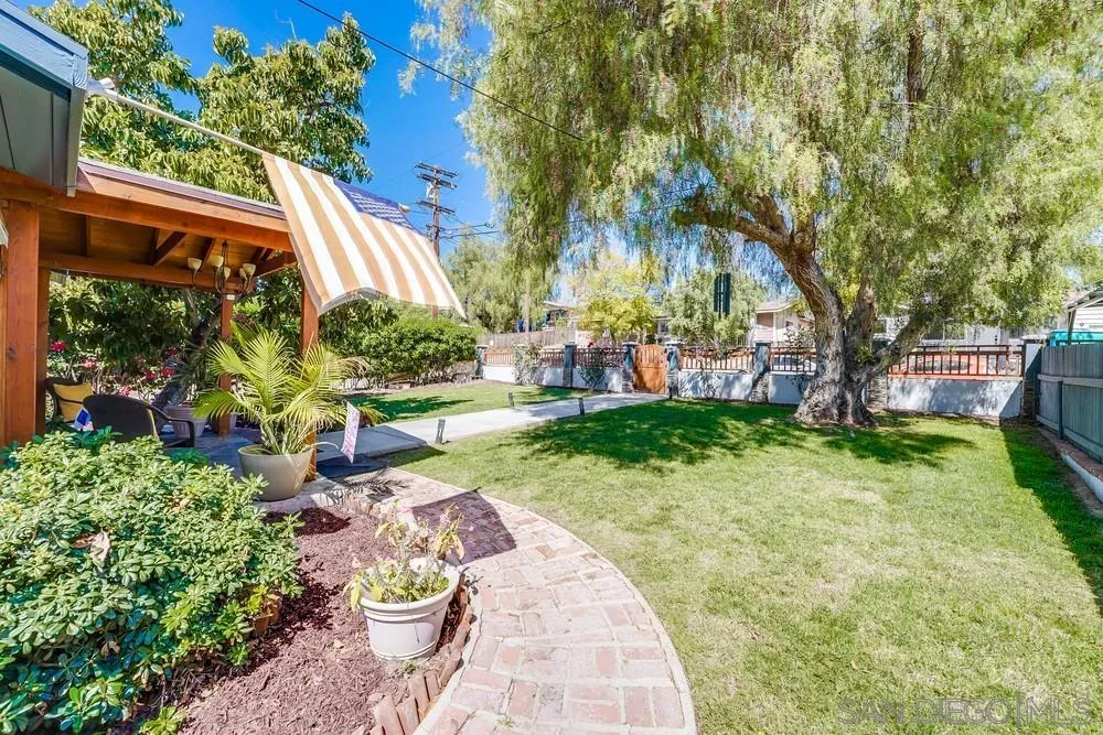 9055 Rosedale Drive Spring Valley, CA 91977 - Photo 3 of 38 a view of a backyard with plants and a patio