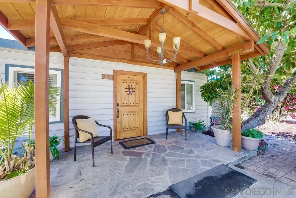 9055 Rosedale Drive Spring Valley, CA 91977 - Photo 34 of 38 a view of a patio with table and chairs and potted plants