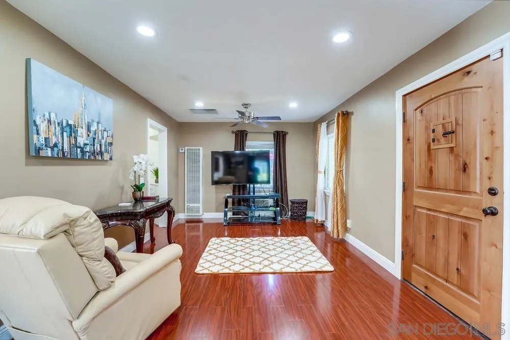 9055 Rosedale Drive Spring Valley, CA 91977 - Photo 8 of 38 a living room with furniture and a flat screen tv