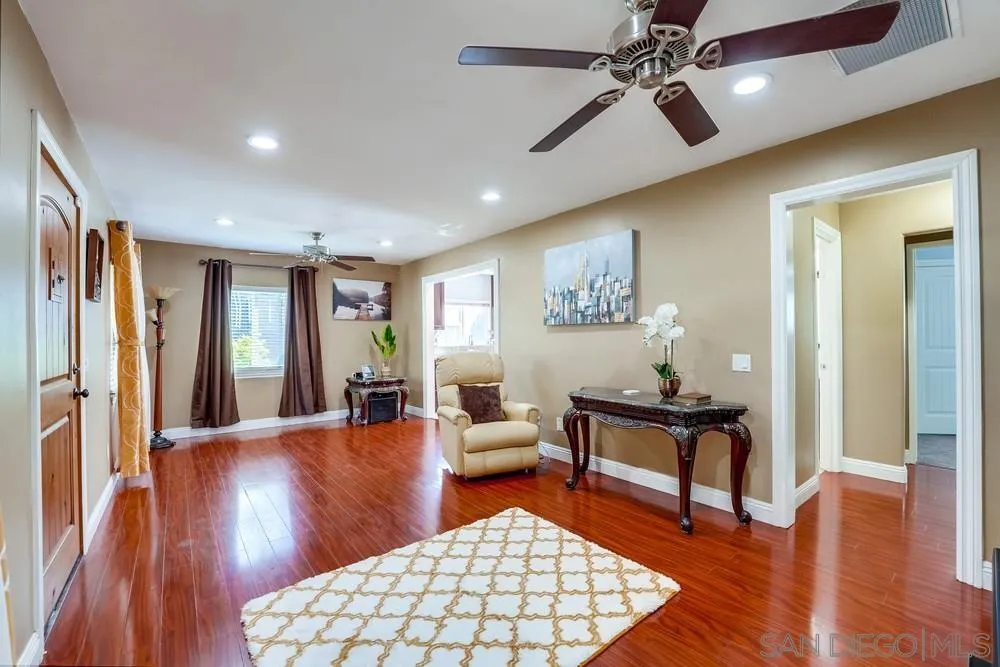 9055 Rosedale Drive Spring Valley, CA 91977 - Photo 9 of 38 a living room with furniture and wooden floor