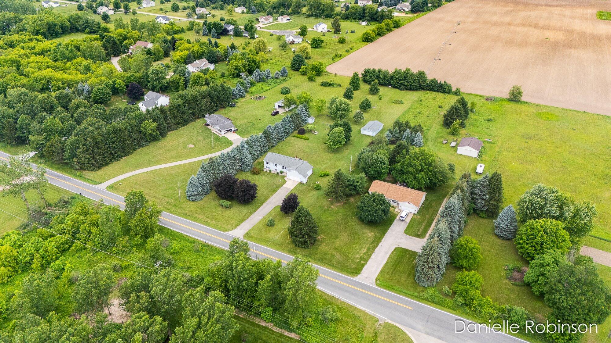 6829 12 Mile Road Northeast Rockford, MI 49341 - Photo 4 of 70 04-WM682912mile-4