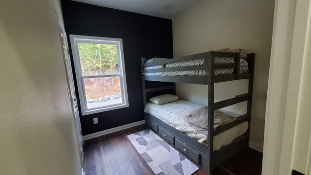 a view of entryway with wooden floor