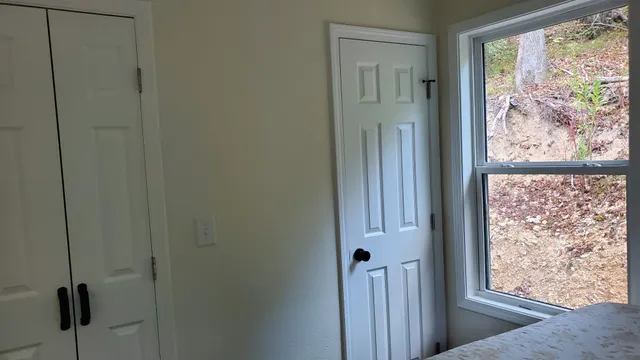 a white toilet sitting next to a bathroom sink