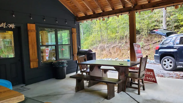 a view of a chairs and table in a livingroom