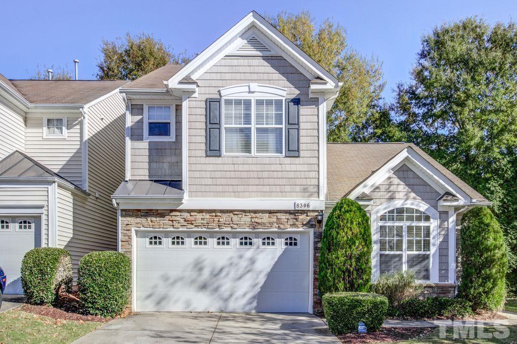 8306 Flat Keystone Drive Raleigh, NC 27613 - Photo 1 of 30 a view of a house with a yard and potted plants