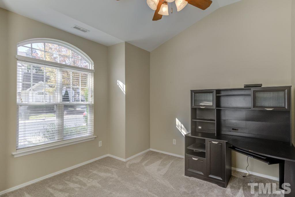 8306 Flat Keystone Drive Raleigh, NC 27613 - Photo 16 of 30 a view of an empty room with a window