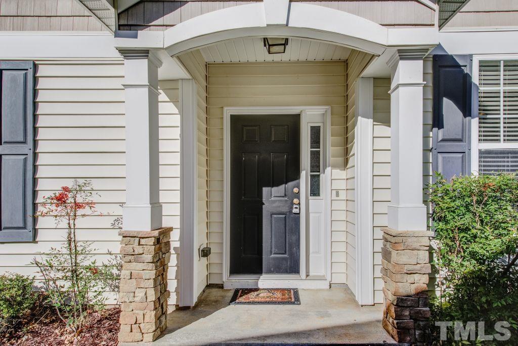 8306 Flat Keystone Drive Raleigh, NC 27613 - Photo 3 of 30 a front view of a house with plants