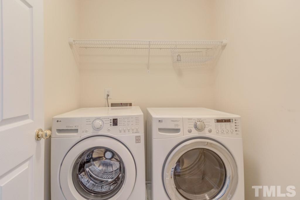 8306 Flat Keystone Drive Raleigh, NC 27613 - Photo 22 of 30 a utility room with dryer and washer
