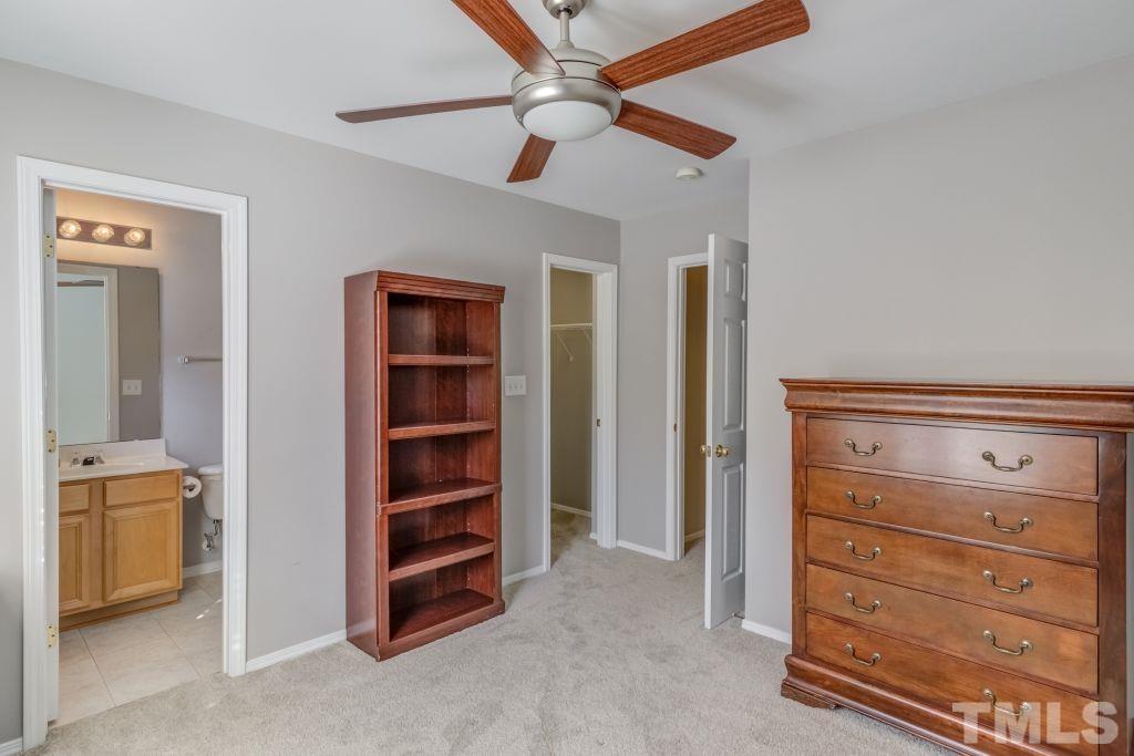 8306 Flat Keystone Drive Raleigh, NC 27613 - Photo 23 of 30 a view of room with closet and cabinet