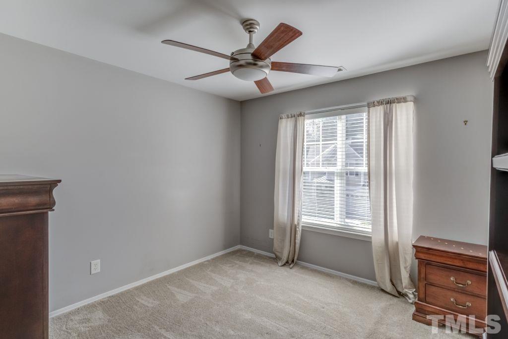 8306 Flat Keystone Drive Raleigh, NC 27613 - Photo 24 of 30 a view of an empty room with a window