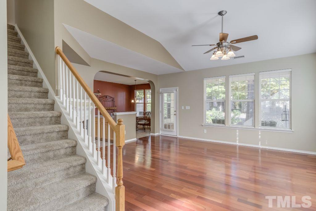 8306 Flat Keystone Drive Raleigh, NC 27613 - Photo 8 of 30 wooden floor in an empty room with a window