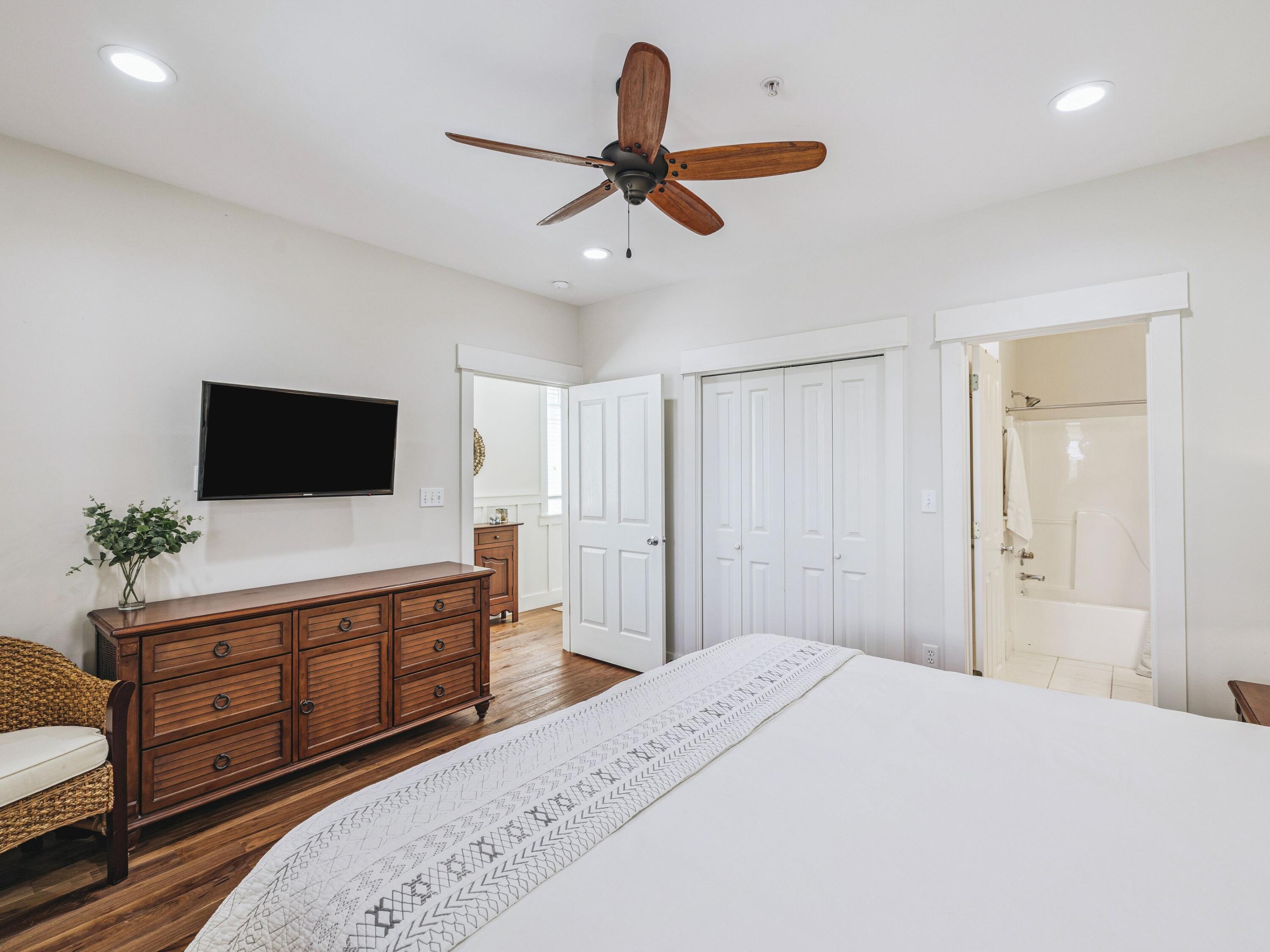4281 East County Highway 30A, Unit 203 Santa Rosa Beach, FL 32459 - Photo 12 of 35 a bedroom with a bed and a flat screen tv