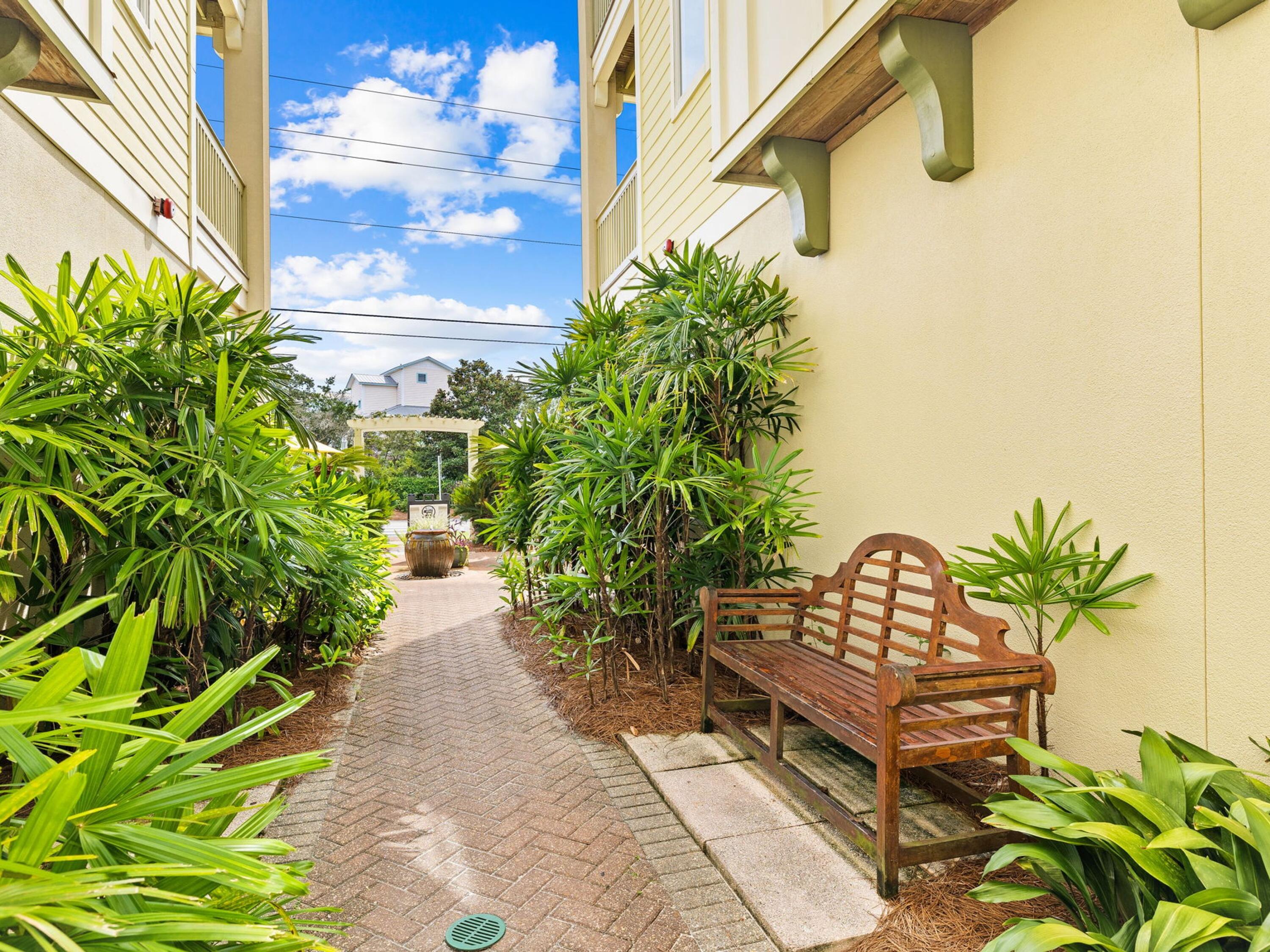 4281 East County Highway 30A, Unit 203 Santa Rosa Beach, FL 32459 - Photo 31 of 35 a garden view with a seating space