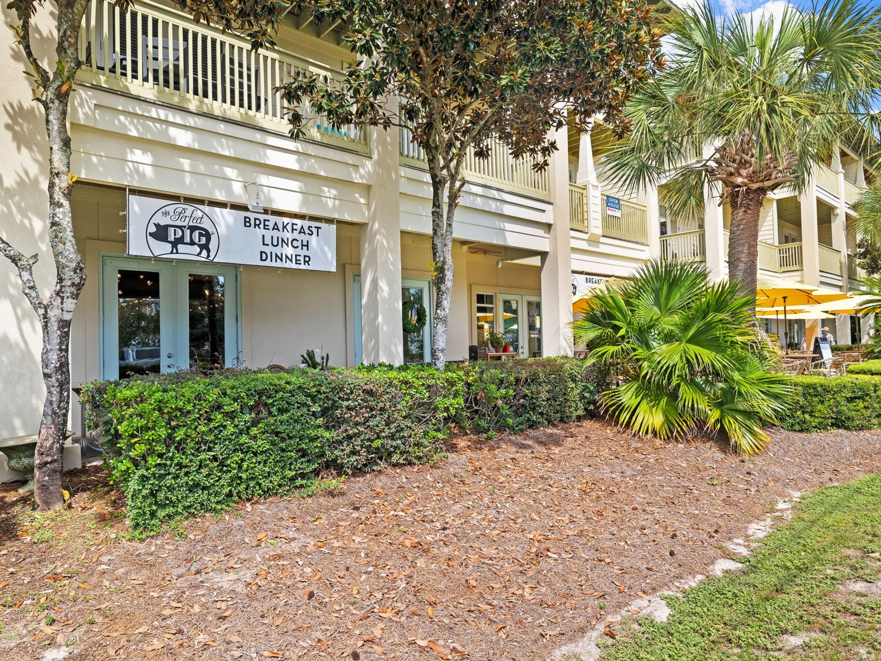 4281 East County Highway 30A, Unit 203 Santa Rosa Beach, FL 32459 - Photo 32 of 35 a view of a building with potted plants