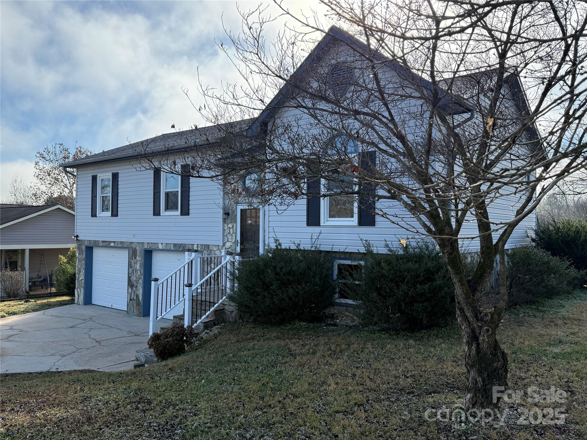 4554 Horseshoe Bend Road Hudson, NC 28638 - Photo 2 of 21 a front view of a house with a yard
