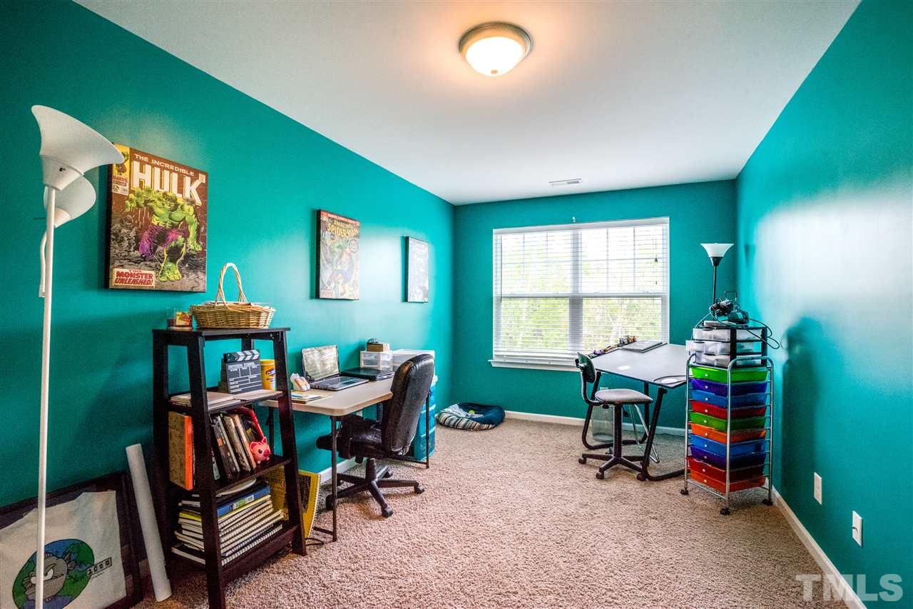 11710 Coppergate Drive, Unit 105 Raleigh, NC 27614 - Photo 13 of 24 a room with furniture and a window