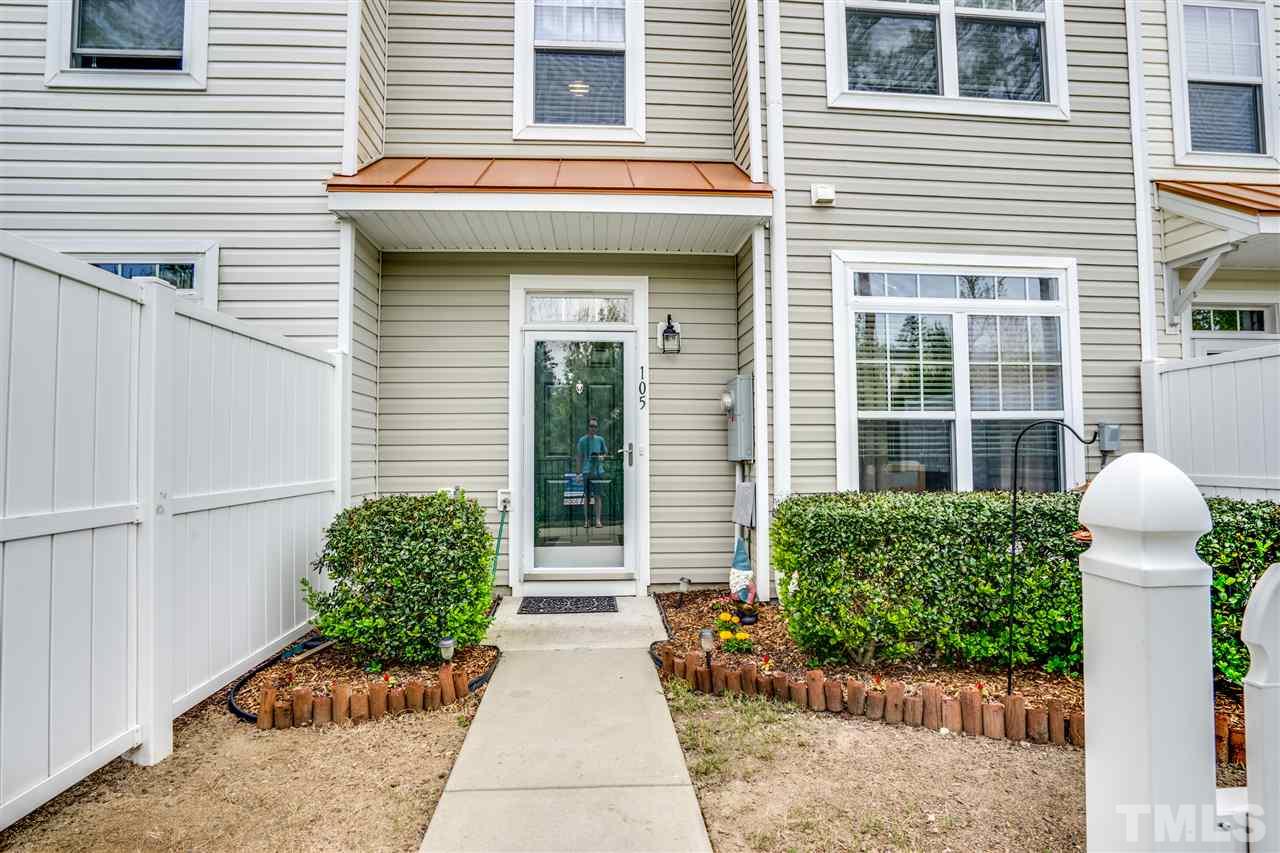 11710 Coppergate Drive, Unit 105 Raleigh, NC 27614 - Photo 2 of 24 a front view of a house with garden