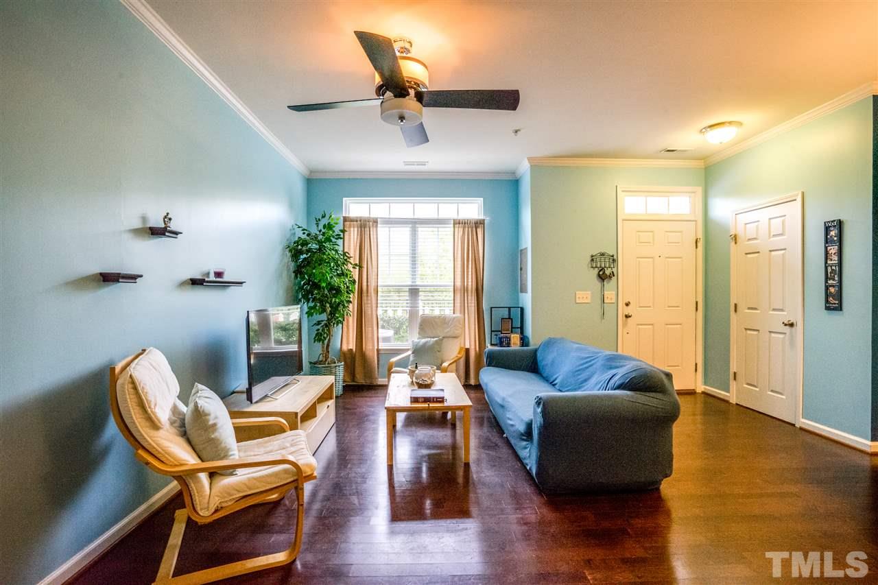11710 Coppergate Drive, Unit 105 Raleigh, NC 27614 - Photo 3 of 24 a living room with furniture