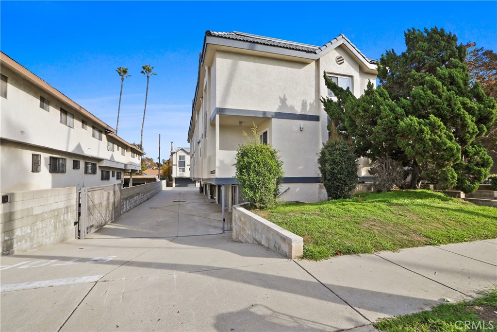 112 North Primrose Avenue, Unit A Alhambra, CA 91801 - Photo 1 of 1 a view of a white building among the street