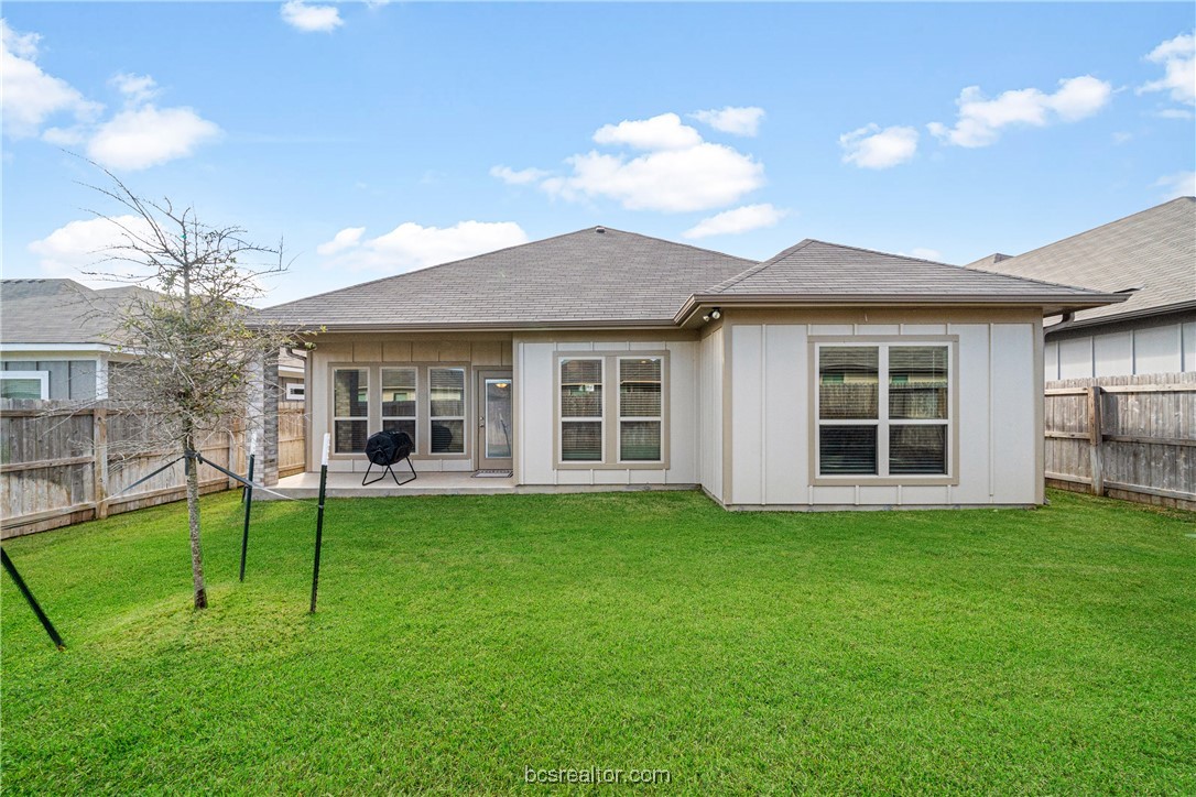 2018 Brisbane Way Bryan, TX 77807 - Photo 37 of 39 a view of a house with a yard and sitting area