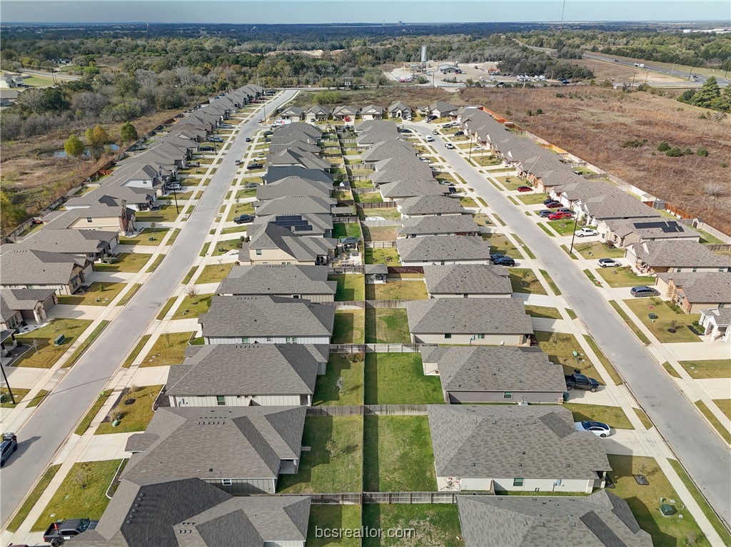 2018 Brisbane Way Bryan, TX 77807 - Photo 8 of 39 an aerial view of residential houses with outdoor space
