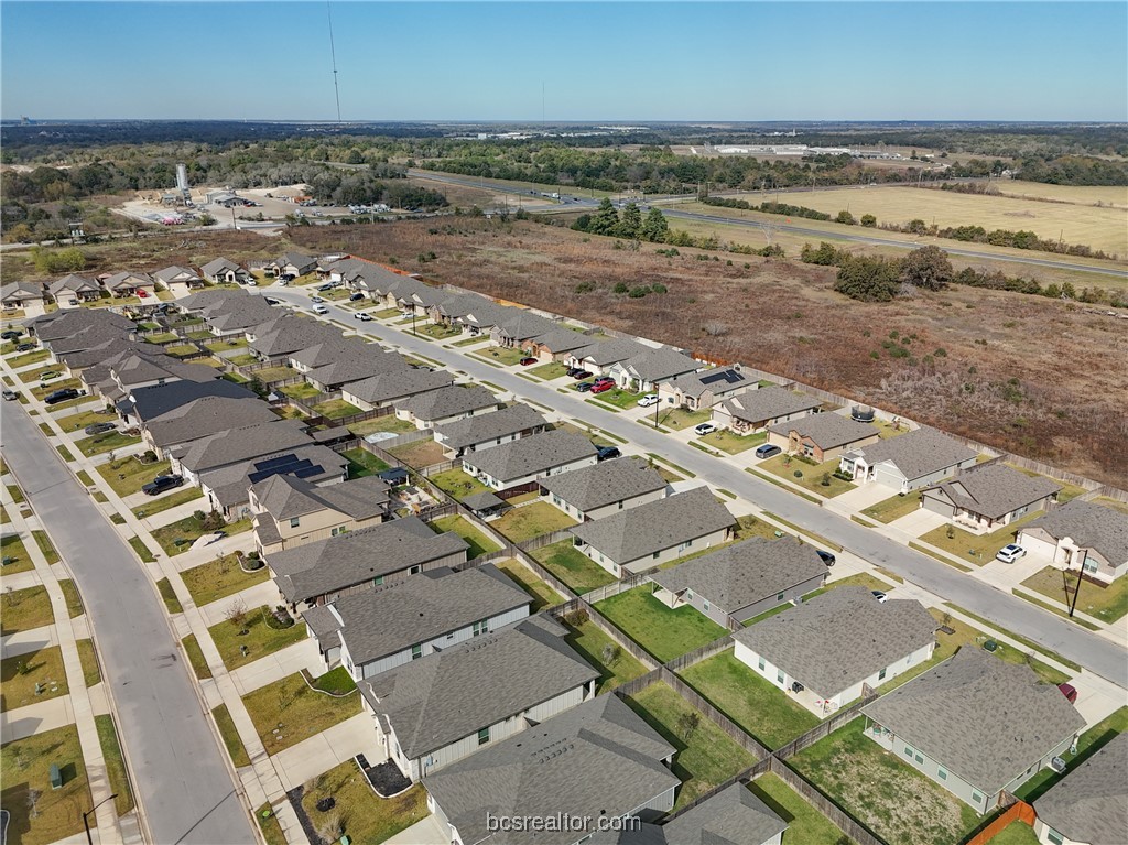 2018 Brisbane Way Bryan, TX 77807 - Photo 9 of 39 an aerial view of residential building and parking space