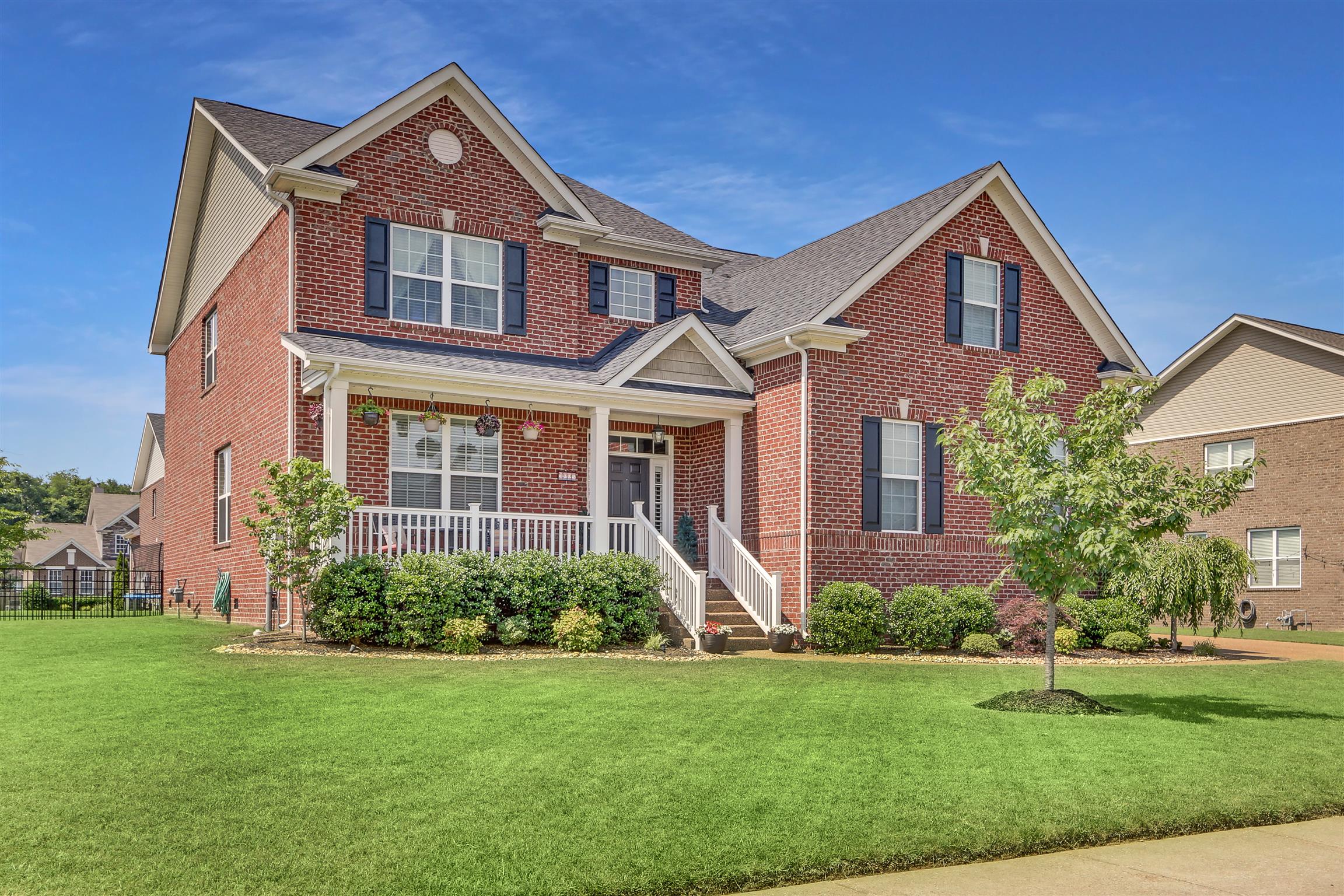 3005 Langston Place Spring Hill, TN 37174 - Photo 2 of 30 a front view of a house with a yard