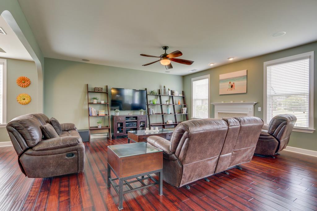 3005 Langston Place Spring Hill, TN 37174 - Photo 10 of 30 a living room with furniture and a wooden floor