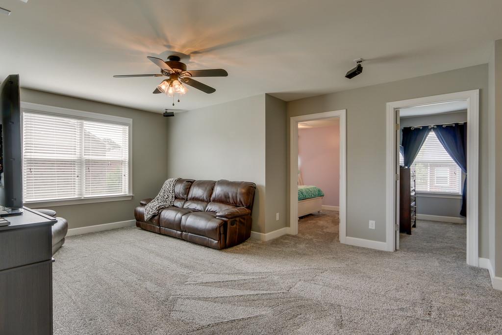 3005 Langston Place Spring Hill, TN 37174 - Photo 18 of 30 a living room with furniture and a window