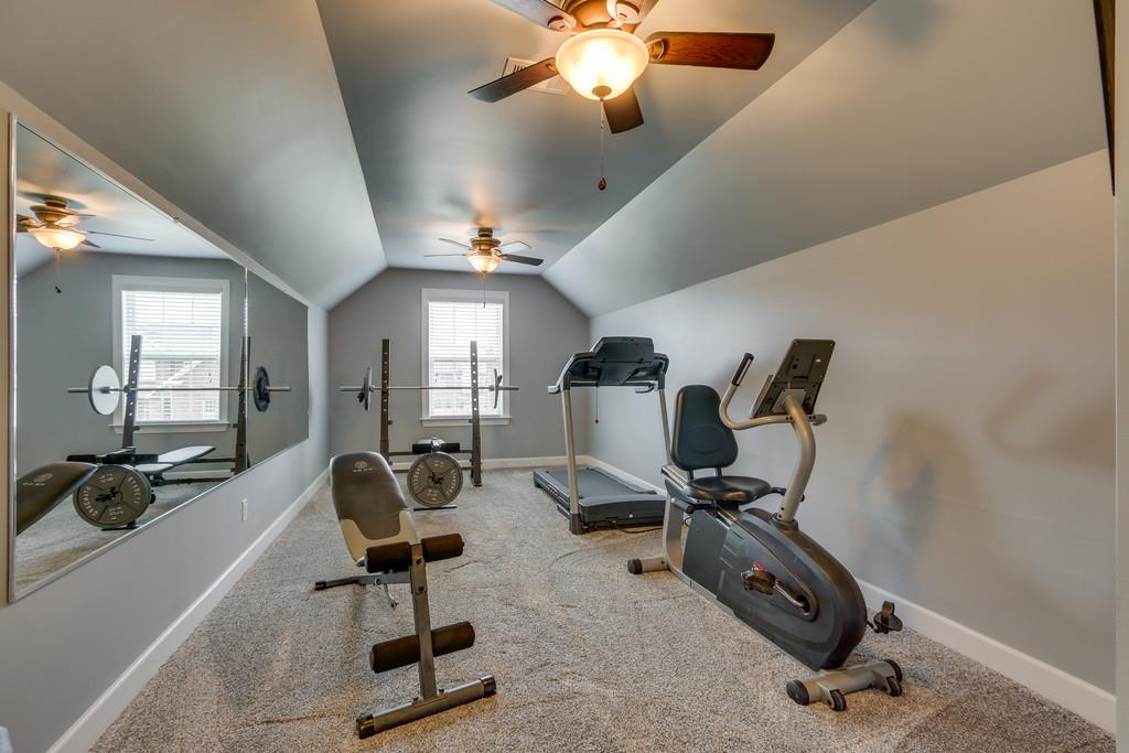 3005 Langston Place Spring Hill, TN 37174 - Photo 21 of 30 a view of a room with gym equipment
