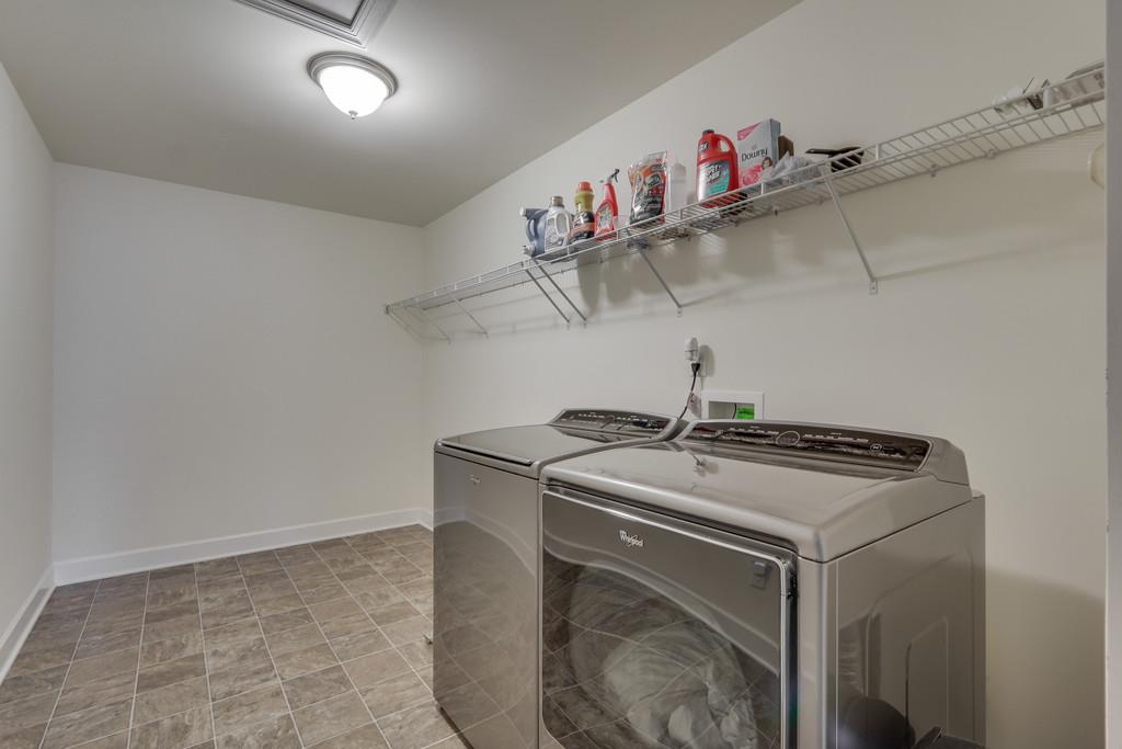 3005 Langston Place Spring Hill, TN 37174 - Photo 26 of 30 a utility room with dryer and washer