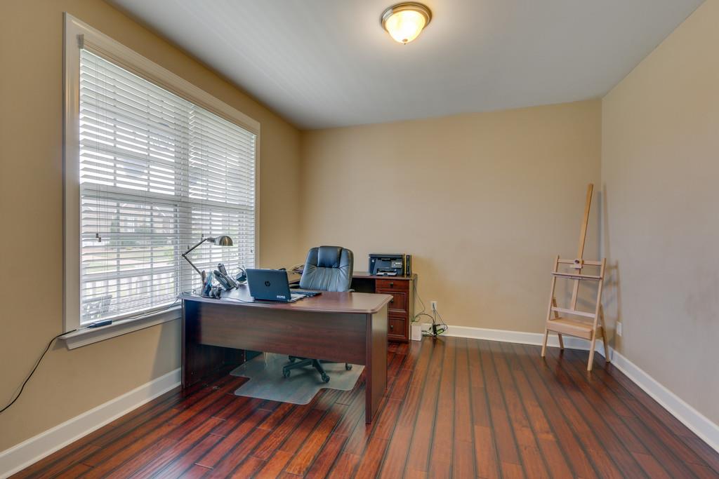 3005 Langston Place Spring Hill, TN 37174 - Photo 7 of 30 a view of a workspace with furniture and a window