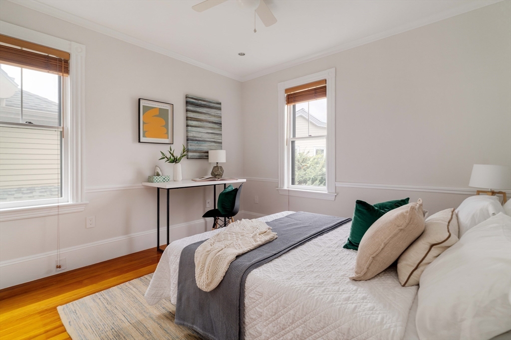 18-20 Windom Street Somerville, MA 02144 - Photo 14 of 34 a bedroom with a bed and a window