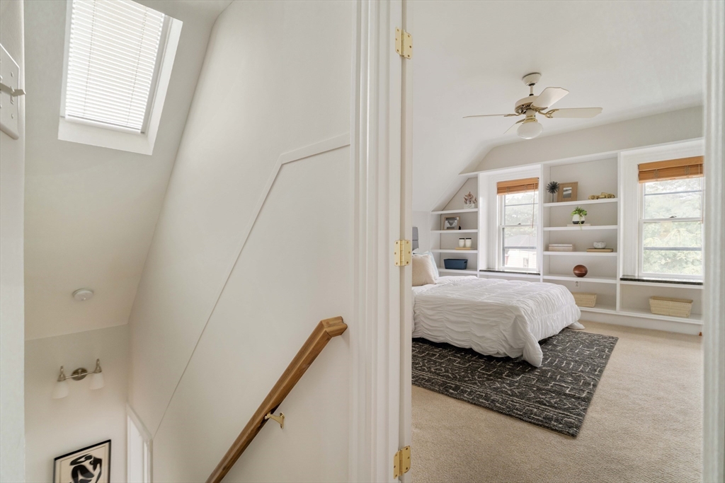 18-20 Windom Street Somerville, MA 02144 - Photo 16 of 34 a bedroom with a bed and a window