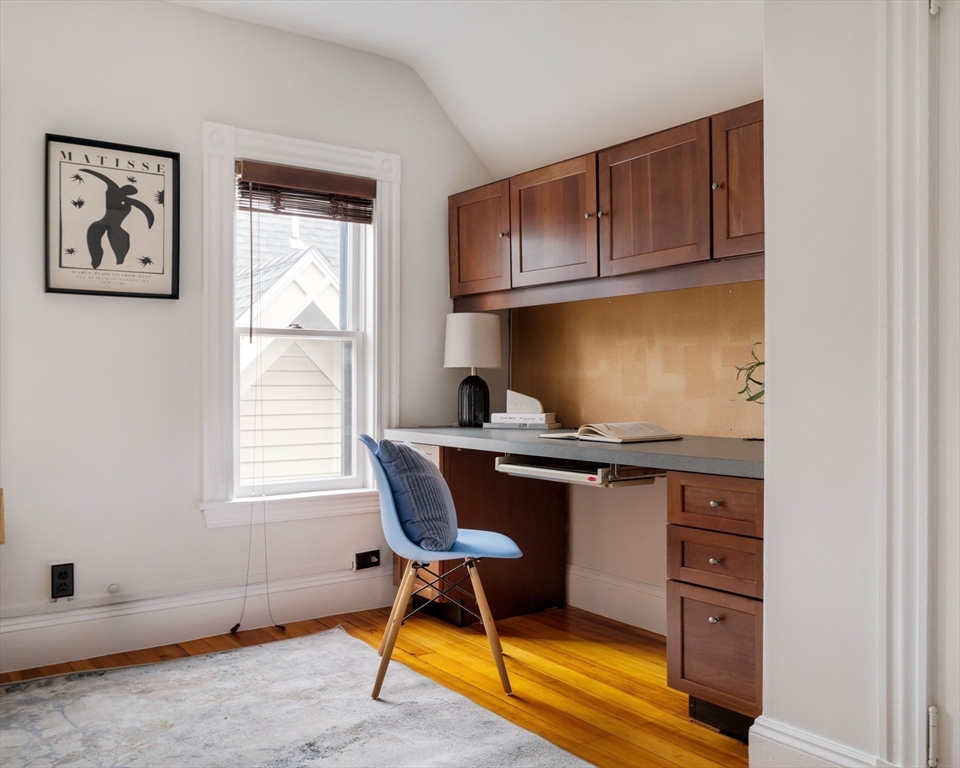 18-20 Windom Street Somerville, MA 02144 - Photo 20 of 34 a workspace with furniture and window