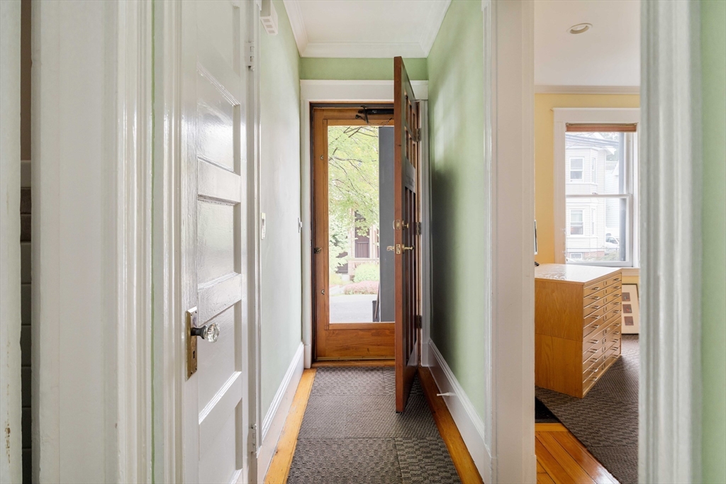 18-20 Windom Street Somerville, MA 02144 - Photo 23 of 34 a view of a bathroom from a hallway