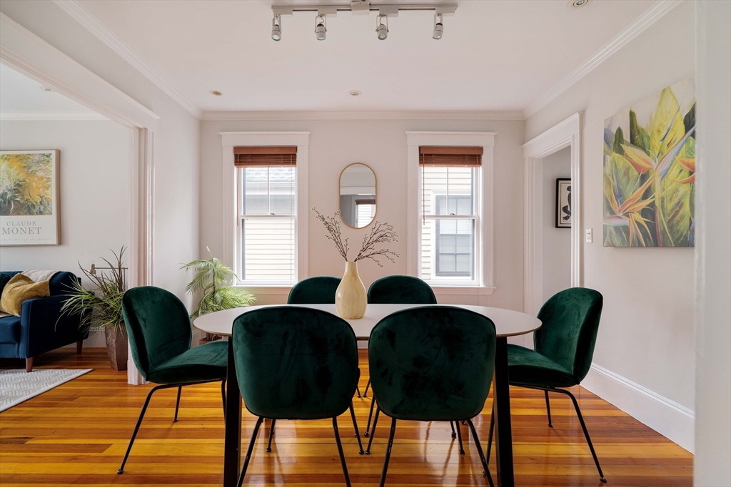 18-20 Windom Street Somerville, MA 02144 - Photo 4 of 34 a living room with furniture and a large window