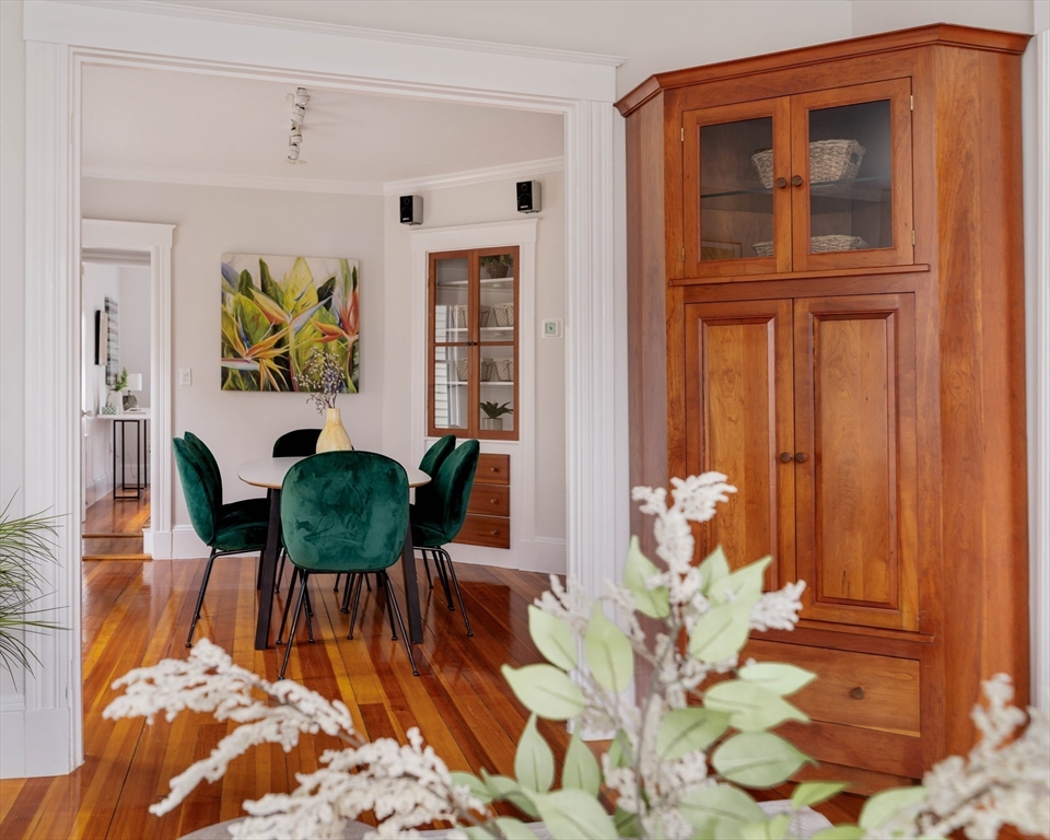 18-20 Windom Street Somerville, MA 02144 - Photo 6 of 34 a dining room with furniture and wooden floor