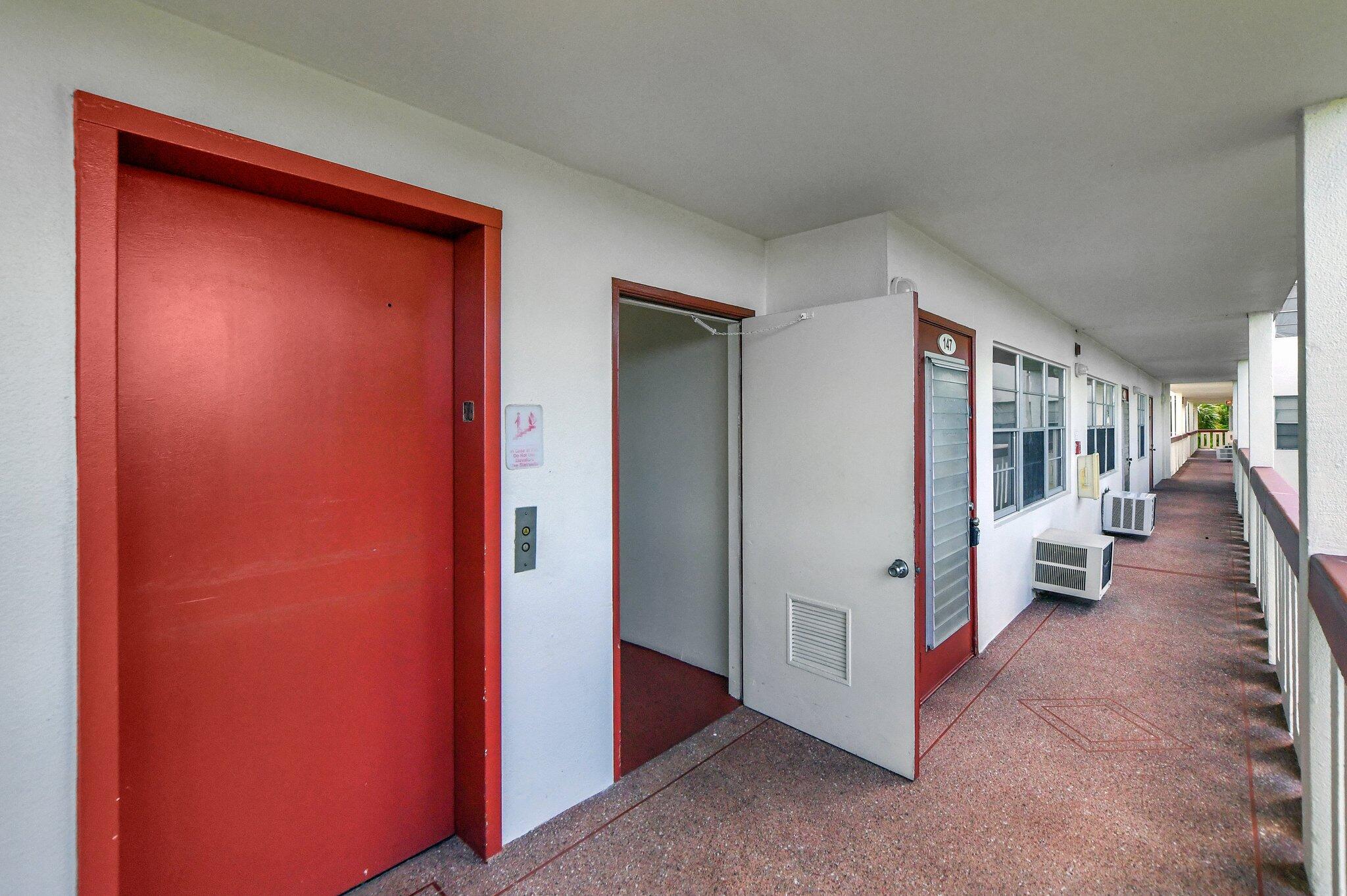 147 Brighton D, Unit D Boca Raton, FL 33434 - Photo 17 of 50 a view of an entryway and livingroom
