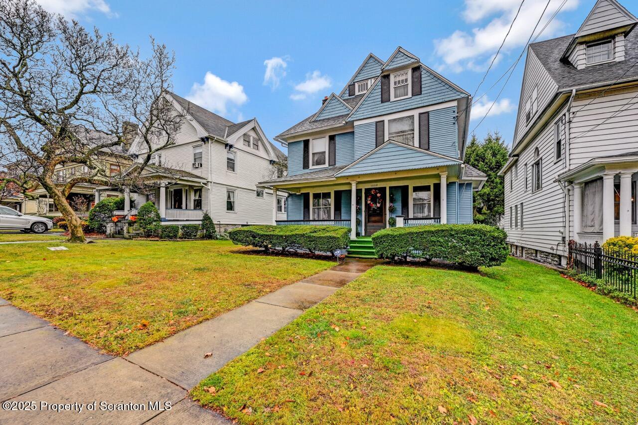 1008 Sunset Street Scranton, PA 18509 - Photo 2 of 54 a front view of an apartment building with swimming pool