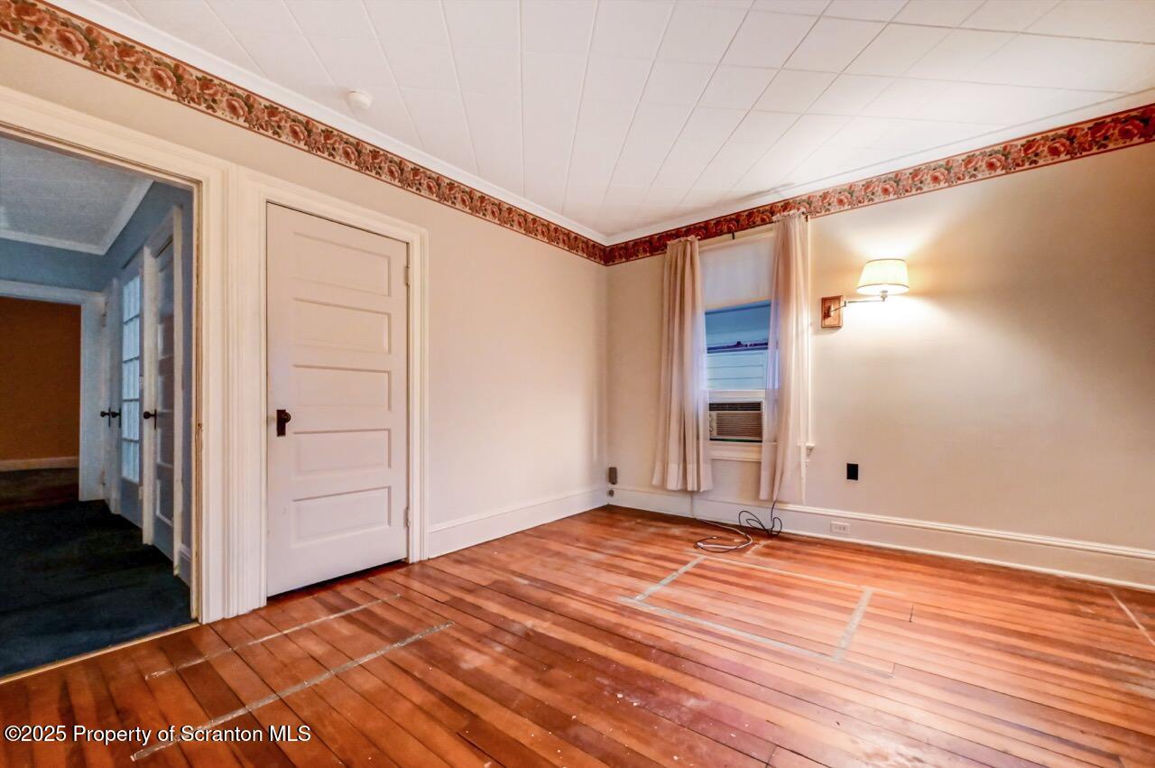 1008 Sunset Street Scranton, PA 18509 - Photo 30 of 54 a view of a room with wooden floor