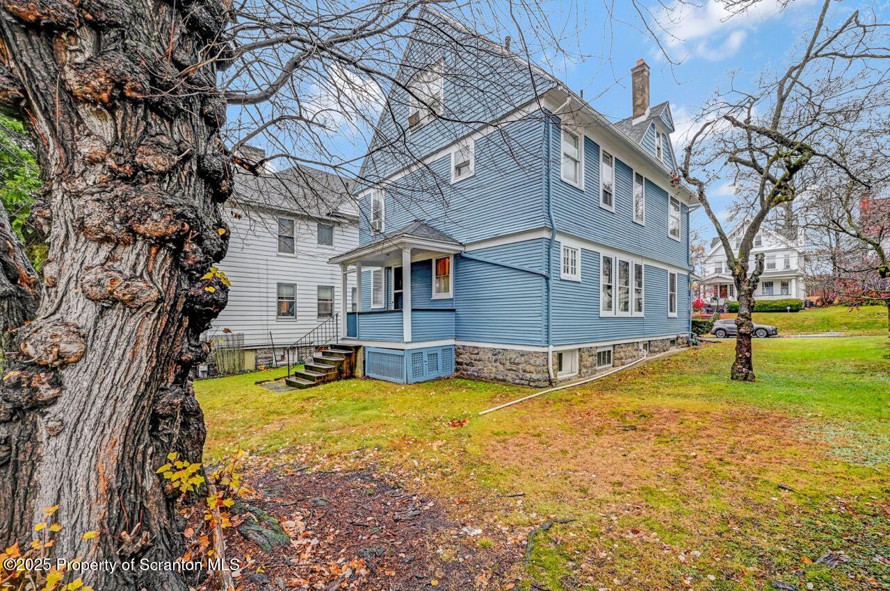 1008 Sunset Street Scranton, PA 18509 - Photo 3 of 54 a view of a house with a swimming pool