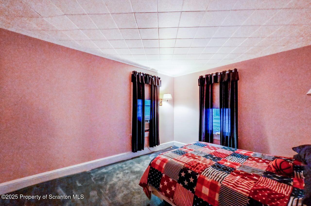 1008 Sunset Street Scranton, PA 18509 - Photo 37 of 54 a bedroom with a bed and a closet