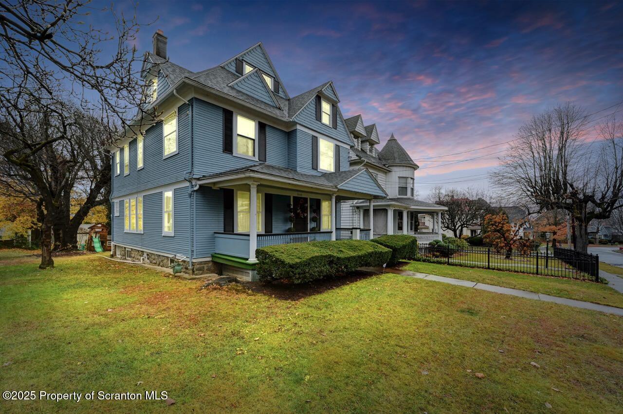 1008 Sunset Street Scranton, PA 18509 - Photo 4 of 54 a front view of a building with garden