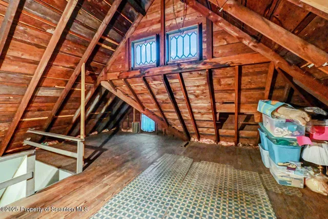 a view of a storage room with an entryway