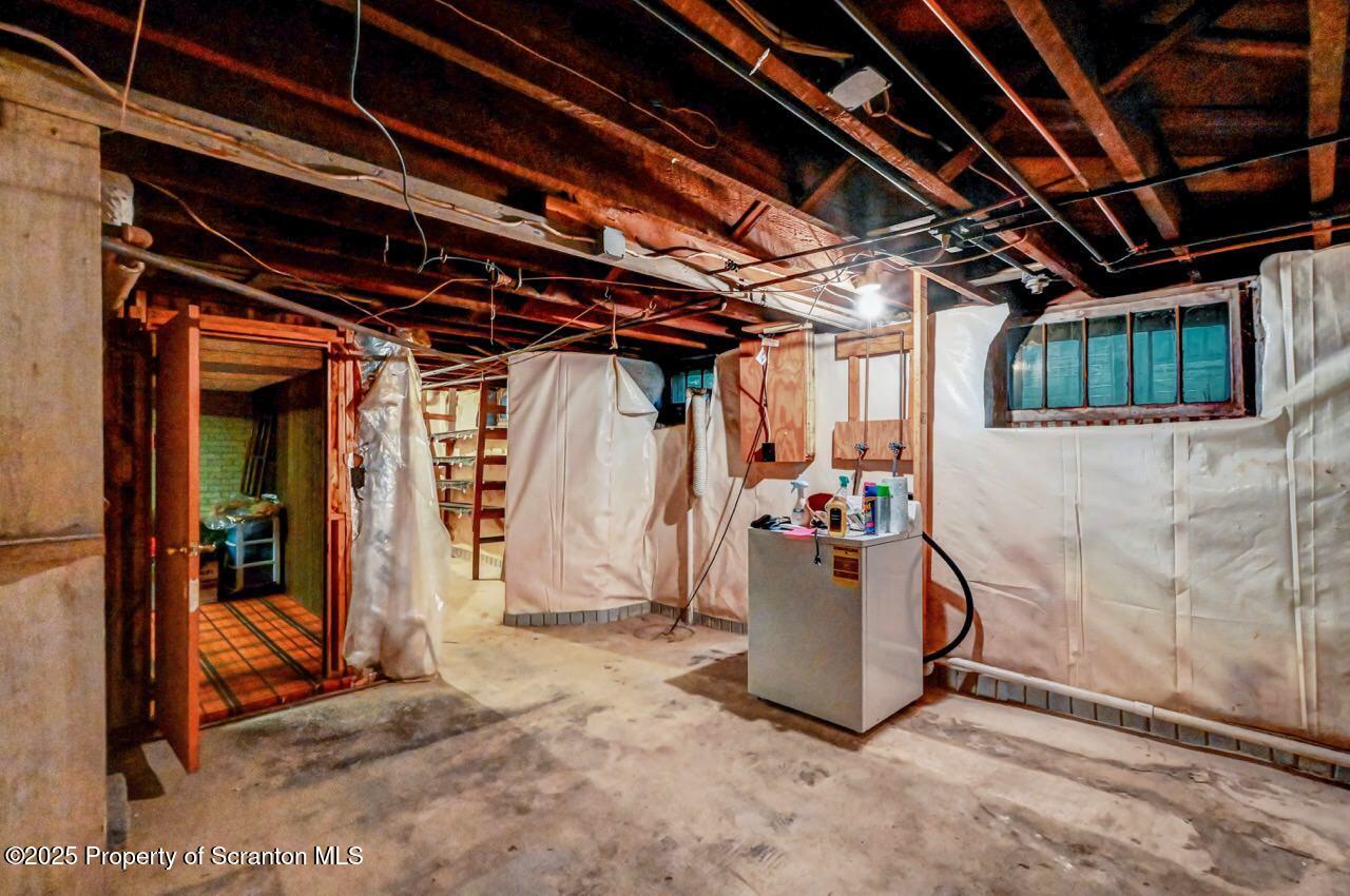 1008 Sunset Street Scranton, PA 18509 - Photo 48 of 54 a view of a storage room with an entryway